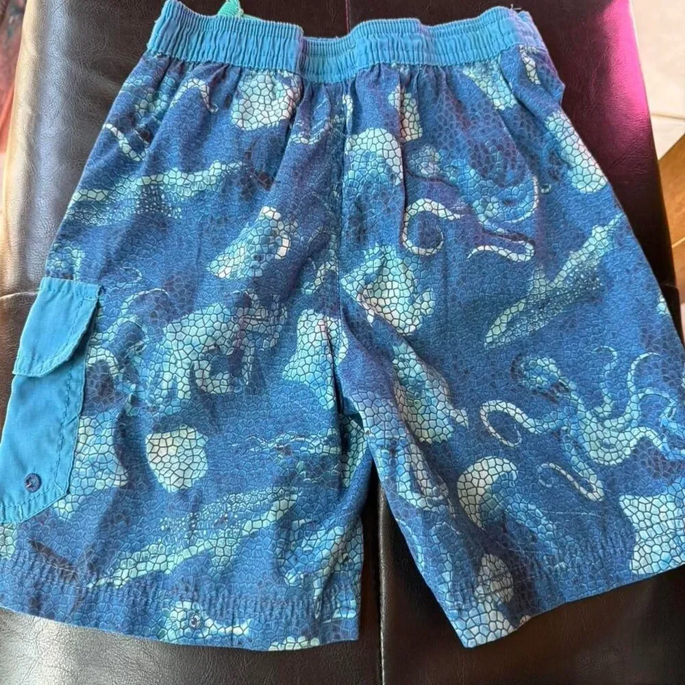 Tommy Bahama blue swim shorts with octopus design. Size: 4